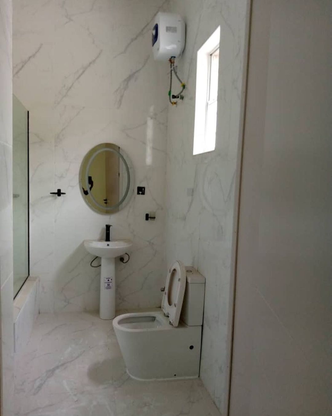Before look of the bathroom renovation by Olivehaus Interiors
