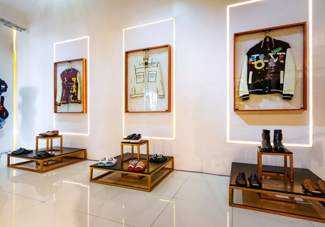 framed jacket display at room xix - a modern fashion store by dhk designs