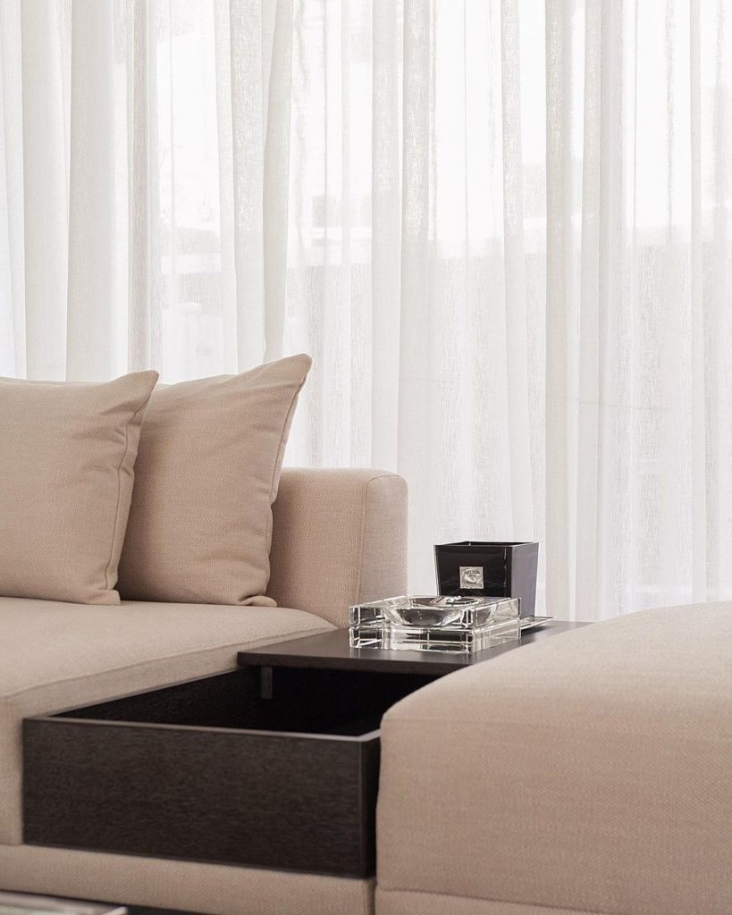 Light coloured sectional sofa in ikoyi home by Urban Living
