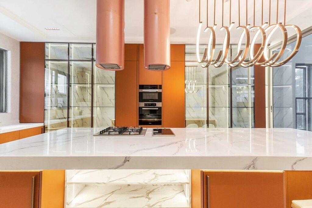 Mid-century rose gold kitchen by Rome signature