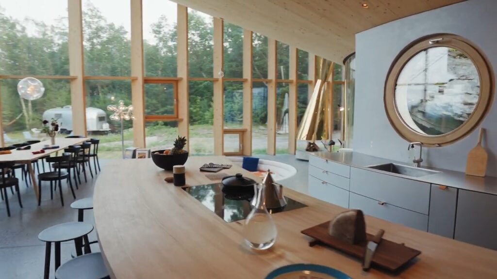Curved Kitchen counter in the house built around a boulder